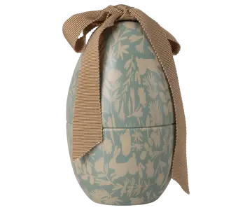 Lys blå metal påskeæg med dyreprint og blød sløjfe