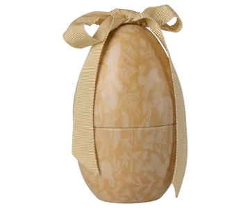 Gul metal påskeæg med dyreprint og blød sløjfe